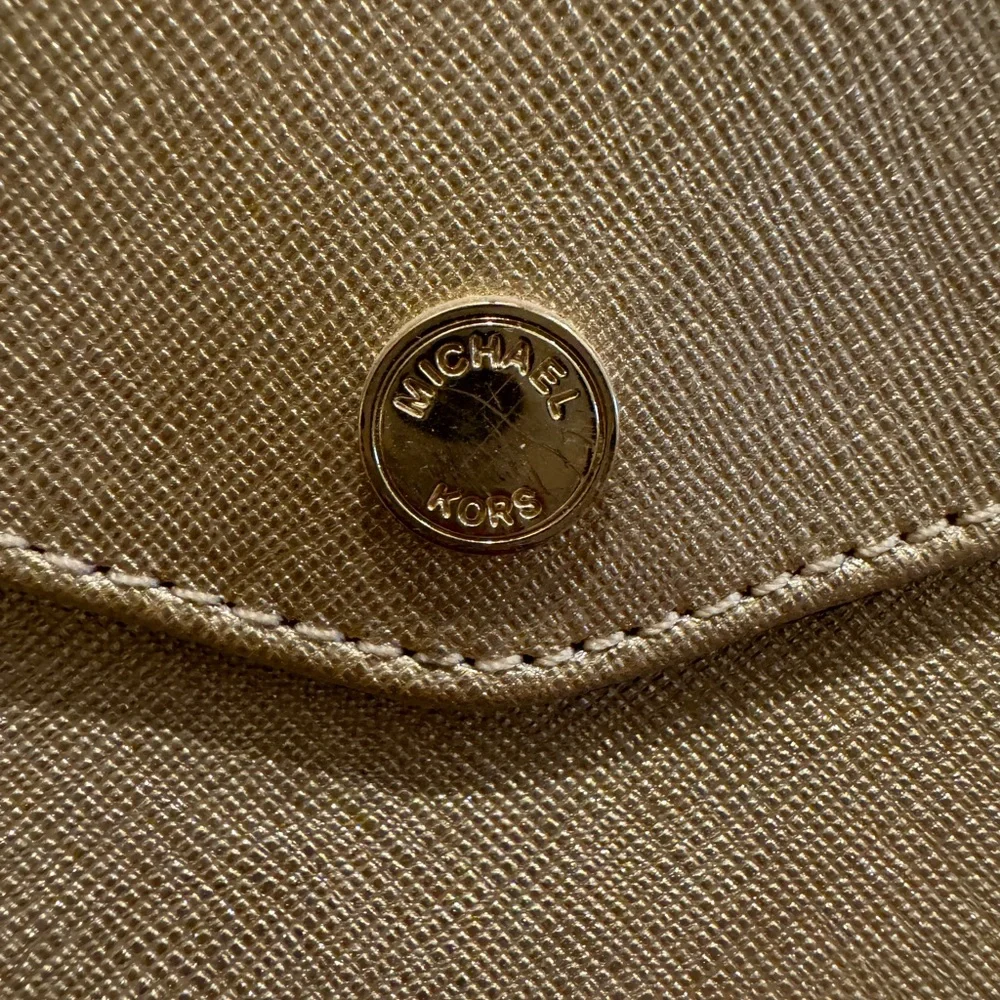 Michael Kors questions leave
